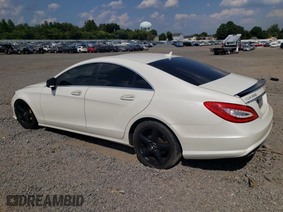 2014 Mercedes-Benz CLS-Class CLS 550 with VIN WDDLJ9BB9EA117290, listed as a Copart auction lot 68517414 with 98,705 mi miles and Salvage Title. Bid and sale history available at carsss.com. Image 2.
