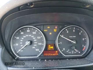 2011 BMW 1 Series 128i with VIN WBAUN1C51BVH82671, listed as a Copart auction lot 43661475 with 115,129 mi miles and Salvage Title. Bid and sale history available at carsss.com. Image 9.