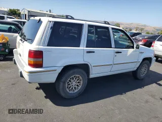 1995 Jeep Grand Cherokee Limited z VIN 1J4GZ78S0SC575083, wystawiony jako Copart lot #61047975 z przebiegiem 205 407 mil mil oraz Czysty tytuł • Clean title. Historia ofert i sprzedaży dostępna na DreamBid. Obrazek 3.