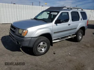 2001 Nissan Xterra XE with VIN 5N1ED28T51C513390, listed as a Copart auction lot 85260414 with 218,377 mi miles and Salvage Title. Bid and sale history available at DreamBid. Image 1.