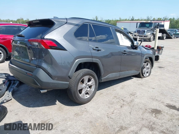 2022 Toyota RAV4 XLE with VIN 2T3W1RFV5NW202544, listed as a IAAI auction lot 42295293 with 60,759 mi miles and . Bid and sale history available at DreamBid. Image 4.