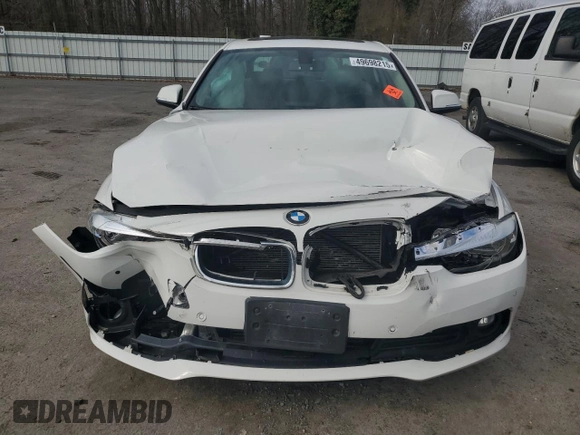 2017 BMW 3 Series 320i xDrive with VIN WBA8E5G57HNU22247, listed as a Copart auction lot 49698215 with Not provided miles and Salvage title. Bid and sale history available at DreamBid. Image 5.