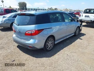 2013 Mazda 5 Touring with VIN JM1CW2CL8D0145628, listed as a IAAI auction lot 42148184 with 137,150 mi miles and . Bid and sale history available at DreamBid. Image 4.
