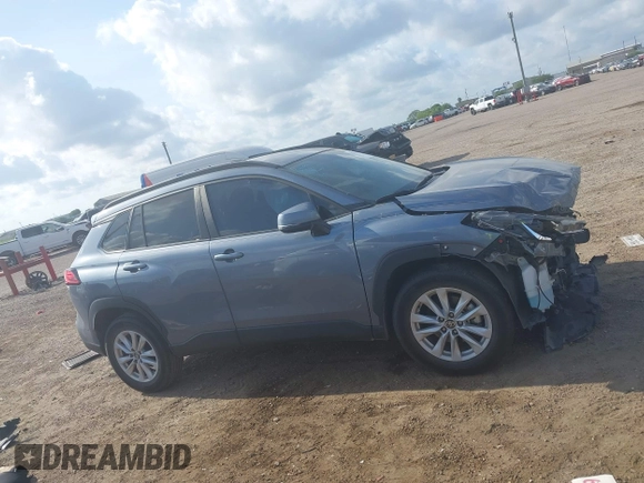2022 Toyota Corolla Cross LE with VIN 7MUCAAAG0NV018245, listed as a IAAI auction lot 42039762 with 26,690 mi miles and . Bid and sale history available at DreamBid. Image 14.