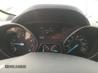 2016 Ford Escape SE z VIN 1FMCU0G99GUC07099, wystawiony jako Copart lot #54575115 z przebiegiem 86 623 mil mil oraz Szkoda całkowita • Salvage title. Historia ofert i sprzedaży dostępna na DreamBid. Obrazek 9.