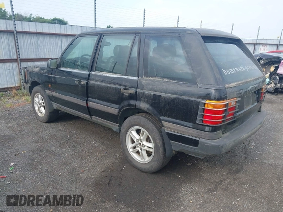 1999 Land Rover Range Rover z VIN SALPV1440XA412936, wystawiony jako IAAI lot #42271704 z przebiegiem 156 881 mil mil oraz . Historia ofert i sprzedaży dostępna na DreamBid. Obrazek 3.