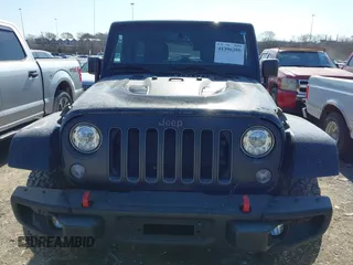 2017 Jeep Wrangler Unlimited Rubicon Recon с VIN 1C4HJWFG0HL737779, выставлен на аукционе IAAI как лот 41396395 с пробегом 125 845 миль миль и . История ставок и продаж доступна на DreamBid. Изображение 6.