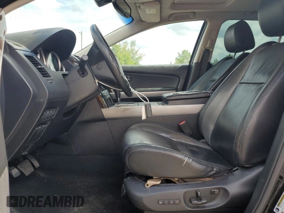 2012 Mazda CX-9 Grand Touring z VIN JM3TB2DAXC0358272, wystawiony jako Copart lot #60703665 z przebiegiem 278 558 mil mil oraz Szkoda całkowita • Salvage title. Historia ofert i sprzedaży dostępna na DreamBid. Obrazek 7.