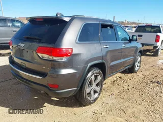 2014 Jeep Grand Cherokee Limited with VIN 1C4RJEBT5EC228056, listed as a IAAI auction lot 41454896 with Not Provided miles and . Bid and sale history available at DreamBid. Image 4.