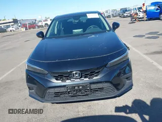 2022 Honda Civic LX z VIN 19XFL2H56NE023472, wystawiony jako IAAI lot #42257114 z przebiegiem 12 149 mil mil oraz . Historia ofert i sprzedaży dostępna na DreamBid. Obrazek 12.