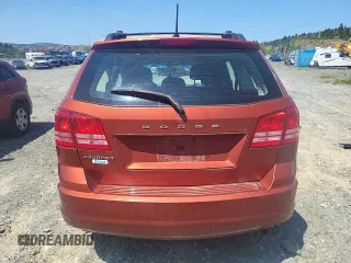 2013 Dodge Journey American Value z VIN 3C4PDCAB1DT656317, wystawiony jako Copart lot #58525885 z przebiegiem 210 834 mil mil oraz Szkoda całkowita • Salvage title. Historia ofert i sprzedaży dostępna na DreamBid. Obrazek 6.