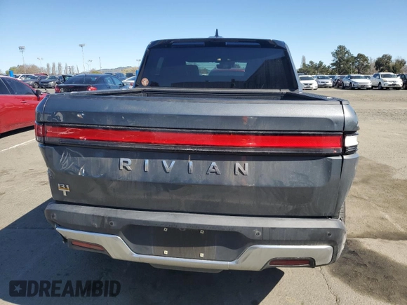 2022 Rivian R1T Adventure z VIN 7FCTGAAA5NN014843, wystawiony jako Copart lot #47668545 z przebiegiem 42 640 mil mil oraz Szkody całkowita. Historia ofert i sprzedaży dostępna na DreamBid. Obrazek 6.