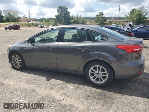 2017 Ford Focus SE with VIN 1FADP3F21HL251357, listed as a Copart auction lot 65214535 with 76,895 mi miles and Clean title. Bid and sale history available at DreamBid. Image 2.