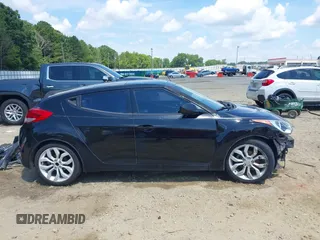 2012 Hyundai Veloster w/Black Int with VIN KMHTC6AD0CU056828, listed as a IAAI auction lot 42611623 with 136,242 mi miles and . Bid and sale history available at DreamBid. Image 14.