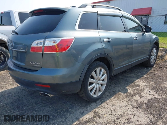 2010 Mazda CX-9 Grand Touring z VIN JM3TB3MV4A0203836, wystawiony jako IAAI lot #42411460 z przebiegiem 156 327 mil mil oraz . Historia ofert i sprzedaży dostępna na DreamBid. Obrazek 4.