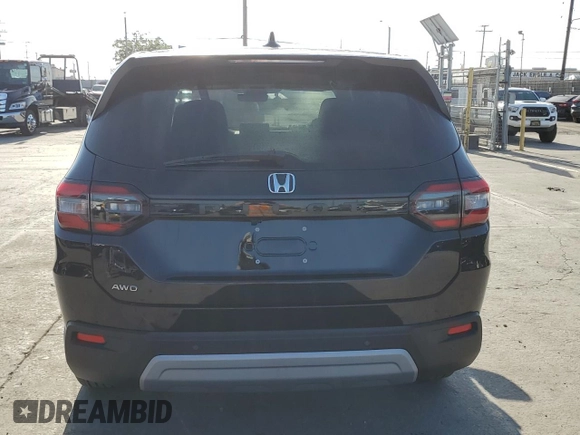 2025 Honda Pilot EX-L z VIN 5FNYG1H4XSB104401, wystawiony jako Copart lot #56923785 z przebiegiem 1 241 mil mil oraz Szkoda całkowita • Salvage title. Historia ofert i sprzedaży dostępna na DreamBid. Obrazek 6.