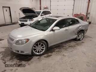 2012 Chevrolet Malibu LTZ with VIN 1G1ZG5E79CF205316, listed as a IAAI auction lot 41936446 with 133,578 mi miles and . Bid and sale history available at DreamBid. Image 2.