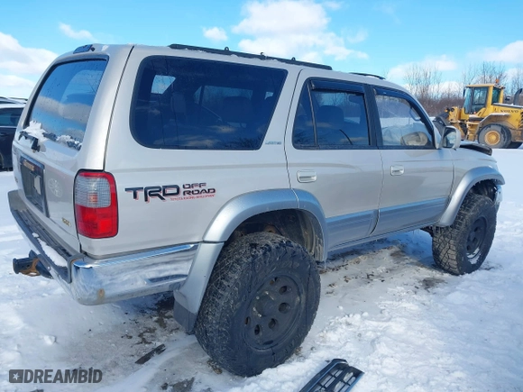 1998 Toyota 4Runner Limited with VIN JT3HN87R2W0184698, listed as a IAAI auction lot 41710285 with 176,068 mi miles. Bid and sale history available at carsss.com. Image 4.