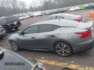 2018 Nissan Maxima S with VIN 1N4AA6AP7JC390262, listed as a IAAI auction lot 41490309 with 141,974 mi miles and . Bid and sale history available at DreamBid. Image 14.