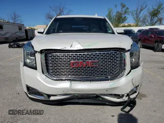2017 GMC Yukon Denali with VIN 1GKS2CKJ5HR310702, listed as a Copart auction lot 51914245 with 115,205 mi miles and Salvage Title. Bid and sale history available at carsss.com. Image 5.