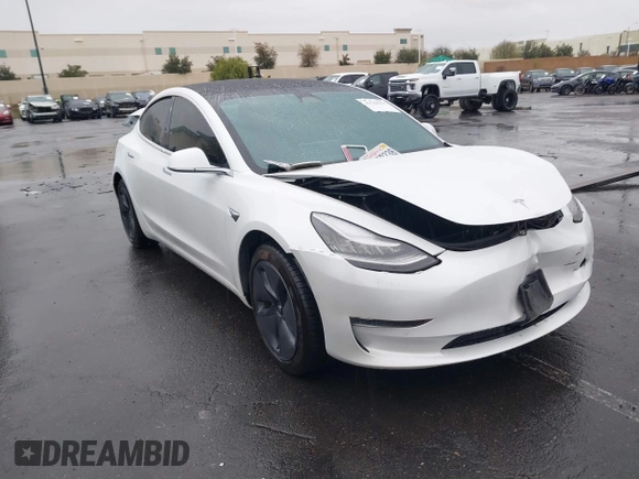 2020 Tesla Model 3 Standard Range Plus with VIN 5YJ3E1EA2LF740225, listed as a IAAI auction lot 41781554 with 46,703 mi miles. Bid and sale history available at carsss.com. Image 1.