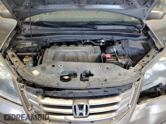 2009 Honda Odyssey EX с VIN 5FNRL38479B019599, выставлен на аукционе Copart как лот 56375175 с пробегом 241 526 миль миль и Списание • Salvage title. История ставок и продаж доступна на DreamBid. Изображение 12.