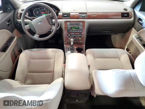 2009 Ford Taurus SE with VIN 1FAHP23W09G125424, listed as a Copart auction lot 65439654 with 138,441 mi miles and Salvage Title. Bid and sale history available at carsss.com. Image 8.