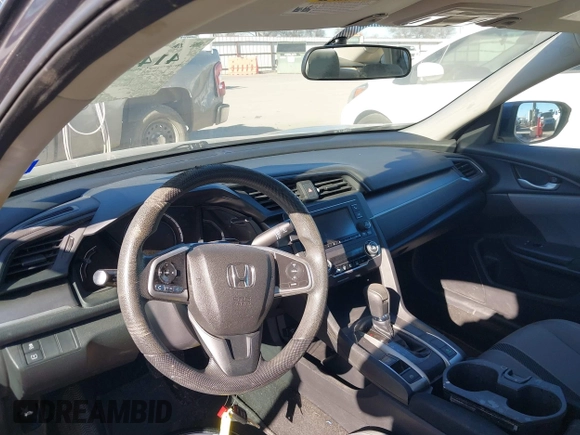2017 Honda Civic LX z VIN 19XFC2F58HE012626, wystawiony jako IAAI lot #41458898 z przebiegiem 120 354 mil mil oraz . Historia ofert i sprzedaży dostępna na DreamBid. Obrazek 19.
