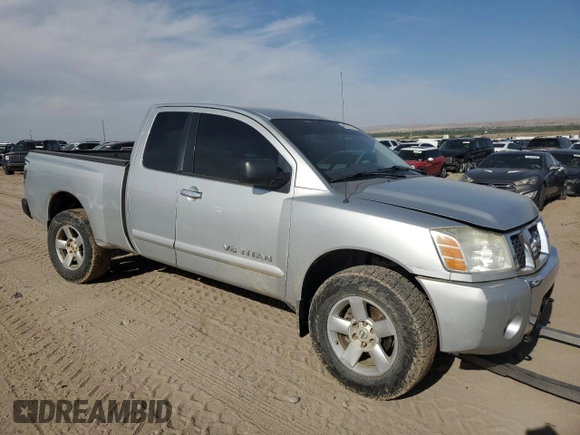 2006 Nissan Titan XE with VIN 1N6AA06B96N543317, listed as a Copart auction lot 55826275 with 236,264 mi miles and Salvage title. Bid and sale history available at DreamBid. Image 4.