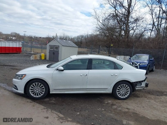 2017 Volkswagen Passat 1.8T SE with VIN 1VWBT7A34HC015593, listed as a IAAI auction lot 41747133 with NaN miles. Bid and sale history available at carsss.com. Image 14.