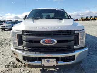 2019 Ford Super Duty F-250 SRW XL with VIN 1FT7W2A69KEF36737, listed as a Copart auction lot 84699994 with 129,810 mi miles and Salvage Title. Bid and sale history available at carsss.com. Image 5.