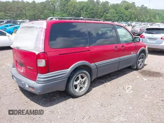 1999 Pontiac Montana with VIN 1GMDX03E6XD186081, listed as a IAAI auction lot 42105419 with 249,120 mi miles and . Bid and sale history available at DreamBid. Image 4.