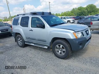 2011 Nissan Xterra S z VIN 5N1AN0NW3BC520077, wystawiony jako IAAI lot #42428815 z przebiegiem 193 081 mil mil oraz . Historia ofert i sprzedaży dostępna na DreamBid. Obrazek 1.
