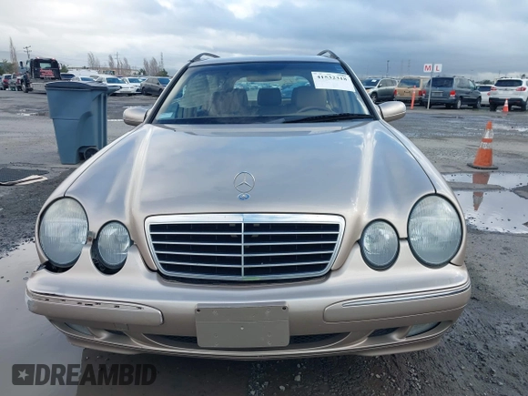 2001 Mercedes-Benz E-Class with VIN WDBJH65J41B349359, listed as a IAAI auction lot 41532318 with 96,375 mi miles. Bid and sale history available at carsss.com. Image 12.