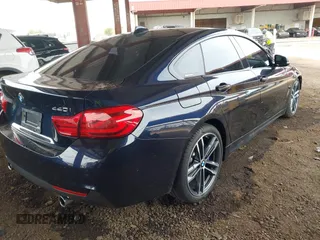 2018 BMW 4 Series 440i with VIN WBA4J5C50JBF07036, listed as a IAAI auction lot 41787949 with 68,821 mi miles and . Bid and sale history available at carsss.com. Image 4.