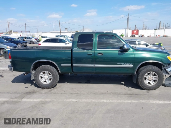 2000 Toyota Tundra SR5 with VIN 5TBRT3417YS122889, listed as a IAAI auction lot 41711107 with 288,475 mi miles and . Bid and sale history available at DreamBid. Image 13.