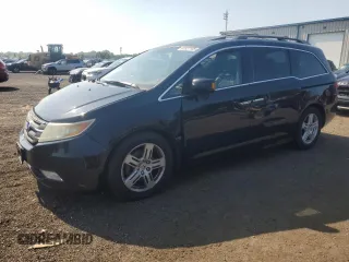 2011 Honda Odyssey Touring with VIN 5FNRL5H98BB073670, listed as a Copart auction lot 61927105 with 128,030 mi miles and Salvage title. Bid and sale history available at DreamBid. Image 1.