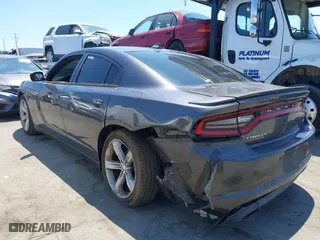 2016 Dodge Charger R/T with VIN 2C3CDXCT7GH233027, listed as a IAAI auction lot 37009912 with 132,960 mi miles. Bid and sale history available at carsss.com. Image 3.