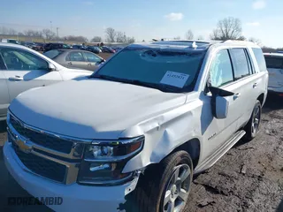 2020 Chevrolet Tahoe LT with VIN 1GNSKBKC1LR290889, listed as a IAAI auction lot 41492821 with 107,843 mi miles. Bid and sale history available at carsss.com. Image 6.