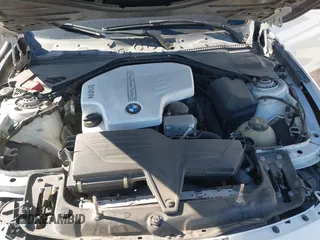 2014 BMW 3 Series 328i xDrive with VIN WBA3B3C56EJ981496, listed as a IAAI auction lot 41822862 with 137,700 mi miles. Bid and sale history available at carsss.com. Image 10.