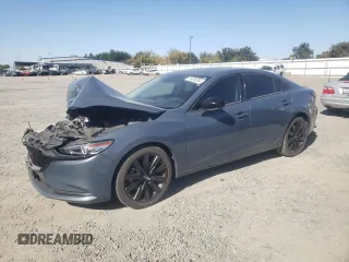2021 Mazda 6 Grand Touring Reserve with VIN JM1GL1WY1M1617013, listed as a Copart auction lot 76836264 with 38,484 mi miles and Salvage Title. Bid and sale history available at DreamBid. Image 1.