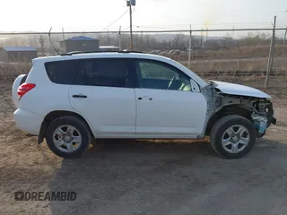 2009 Toyota RAV4 with VIN JTMBF33VX9D001291, listed as a IAAI auction lot 41792376 with 104,318 mi miles and . Bid and sale history available at DreamBid. Image 14.