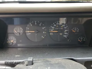 1995 Jeep Grand Cherokee Laredo with VIN 1J4FX58S8SC773884, listed as a Copart auction lot 56572555 with 424,126 mi miles and Salvage title. Bid and sale history available at DreamBid. Image 9.