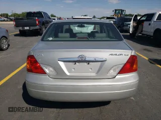 2000 Toyota Avalon XL with VIN 4T1BF28B7YU112576, listed as a Copart auction lot 59726505 with 242,412 mi miles and Salvage title. Bid and sale history available at DreamBid. Image 6.