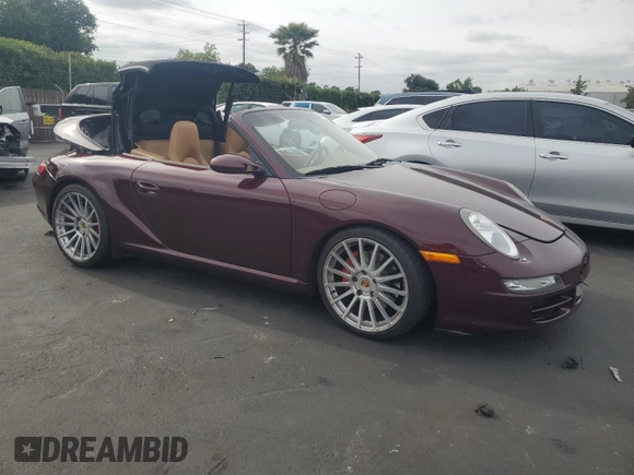 2006 Porsche 911 Carrera S z VIN WP0CB29956S769773, wystawiony jako Copart lot #54702225 z przebiegiem Nie podano mil oraz Szkoda całkowita • Salvage title. Historia ofert i sprzedaży dostępna na DreamBid. Obrazek 4.
