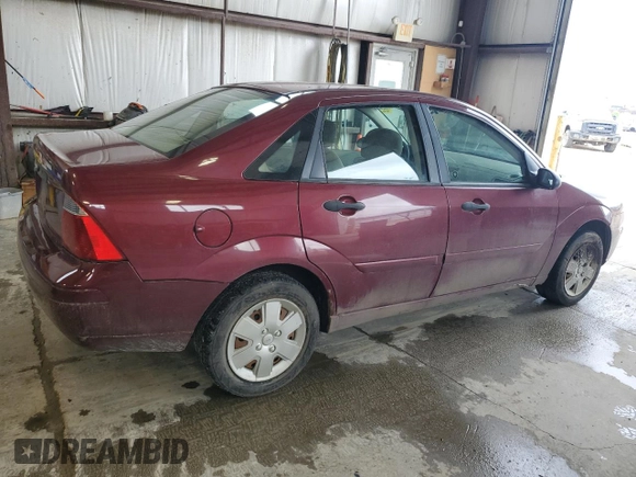 2007 Ford Focus S z VIN 1FAFP34N77W249390, wystawiony jako Copart lot #61817215 z przebiegiem 112 295 mil mil oraz Szkoda całkowita • Salvage title. Historia ofert i sprzedaży dostępna na DreamBid. Obrazek 3.