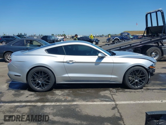 2019 Ford Mustang EcoBoost с VIN 1FA6P8TH8K5194620, выставлен на аукционе IAAI как лот 42162362 с пробегом 29 121 миль миль и . История ставок и продаж доступна на DreamBid. Изображение 14.