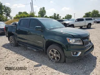 2015 Chevrolet Colorado 4WD Z71 with VIN 1GCGTCE35F1149677, listed as a Copart auction lot 64271015 with 39,671 mi miles and Clean title. Bid and sale history available at DreamBid. Image 4.