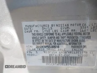 2014 Nissan Versa SV with VIN 3N1CN7AP5EL809218, listed as a IAAI auction lot 42096891 with 87,559 mi miles. Bid and sale history available at carsss.com. Image 9.