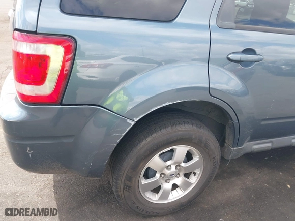 2011 Ford Escape Limited with VIN 1FMCU0EG9BKA56173, listed as a IAAI auction lot 41889169 with 109,825 mi miles. Bid and sale history available at carsss.com. Image 12.